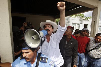 Honduran President Manuel Zelaya talks to supporters Saturday in Las Manos, Nicaragua, near the Honduran border.  (Associated Press / The Spokesman-Review)