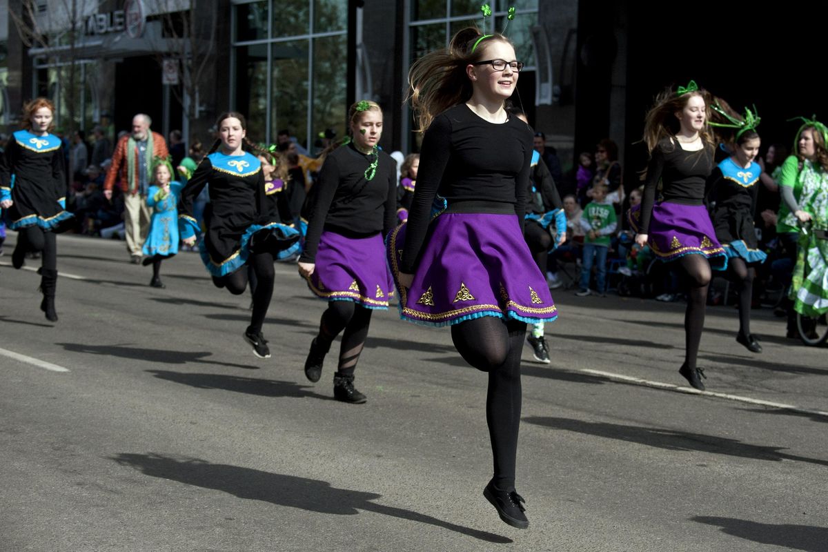 Members of Spokane Irish Dance perform for the crowd during the St. Patrick’s Day Parade in Spokane on March 16, 2019. (Kathy Plonka / The Spokesman-Review)