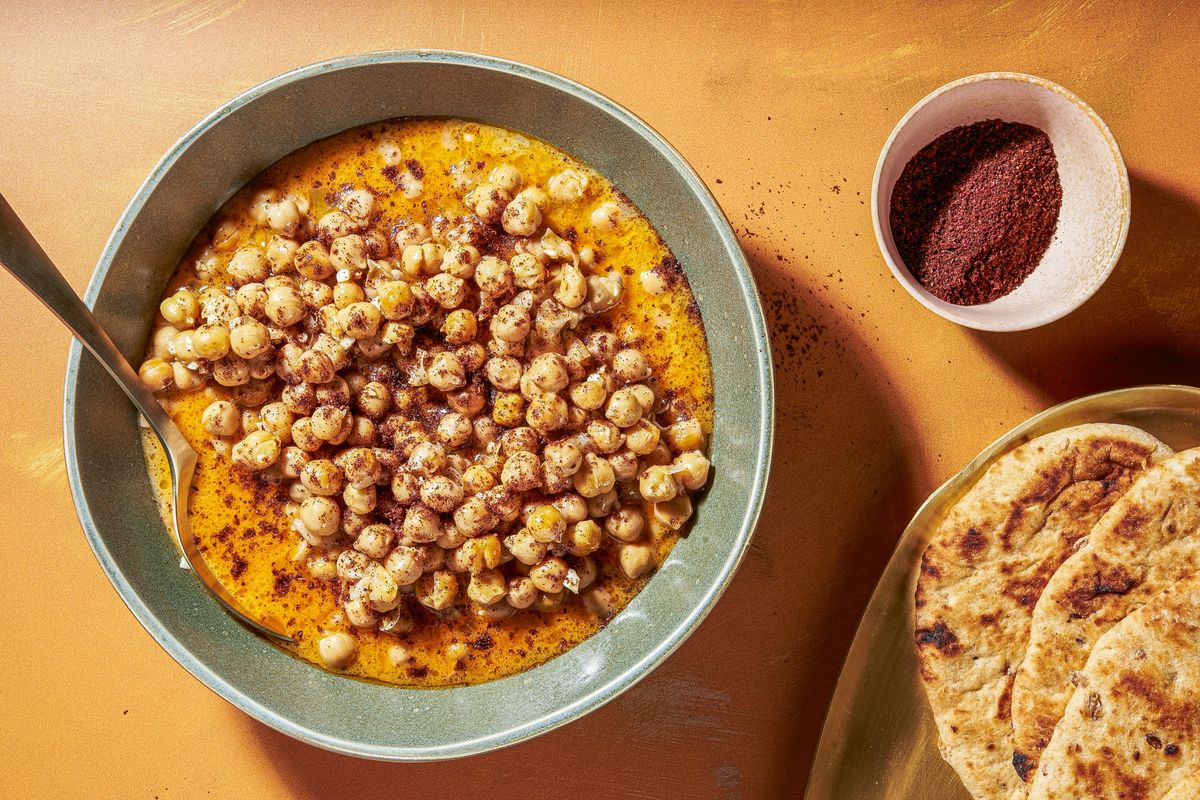 Dango, or Omani-style chickpeas, is a warm, comforting dish.  (Rey Lopez for The Washington Post/Food styling by Lisa Cherkasky for The Washington Post)