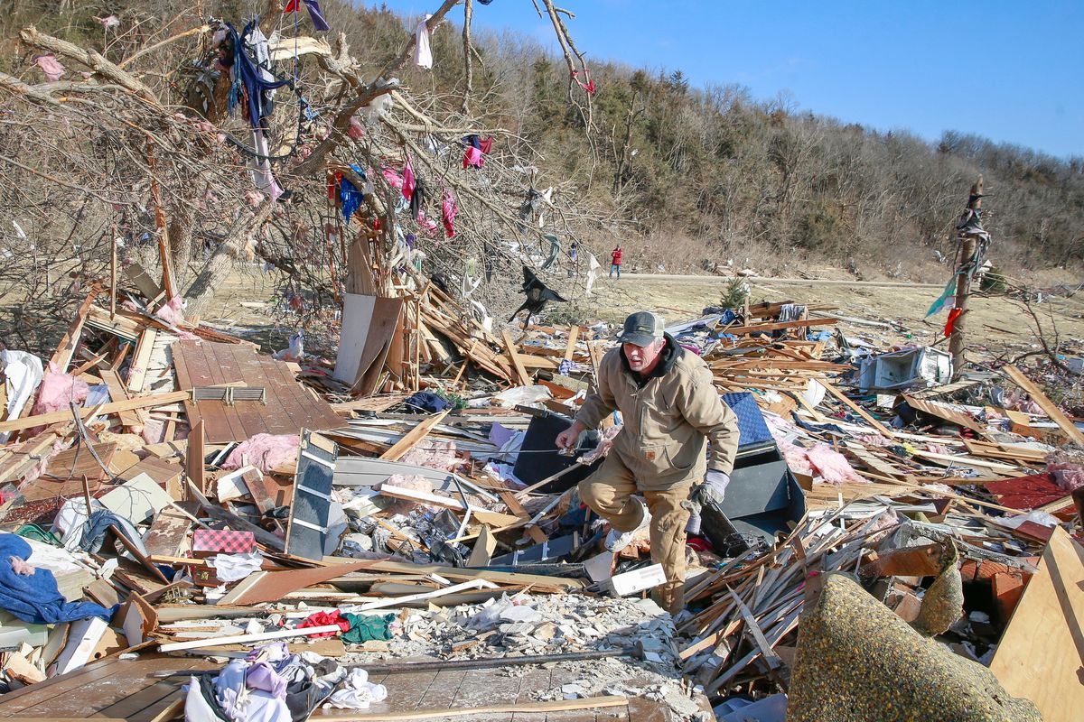 Cleanup efforts are underway in Winterset, Iowa, on Sunday, March 6, 2022, after a tornado tore through an area southwest of town on Saturday.  (Bryon Houlgrave)