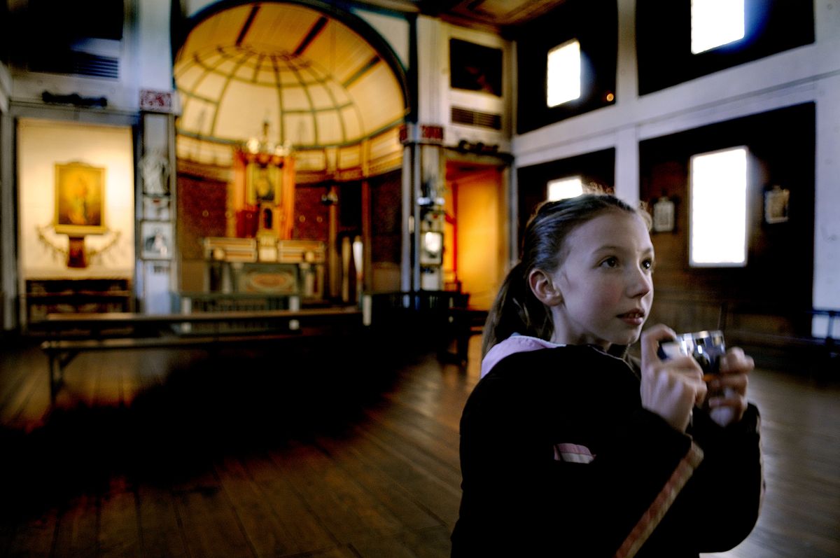 Baillee Schott, 11, of Bozeman,  stopped at the Cataldo Mission on her way to Spokane on Tuesday.  State officials say budget cuts will force them to cut off funding July 1 to the Old Mission State Park in North Idaho.  (Photos by KATHY PLONKA / The Spokesman-Review)