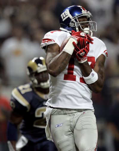 Plaxico Burress’ suspension cost him one week’s pay: $117,500. (Associated Press / The Spokesman-Review)