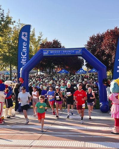 Participants join the 2022 MultiCare Spokane Bridge to Brunch 5K, an annual fundraiser with proceeds from this year’s Sept. 30 race going to its foundation in support of Deaconess Hospital’s NICU.  (Courtesy)