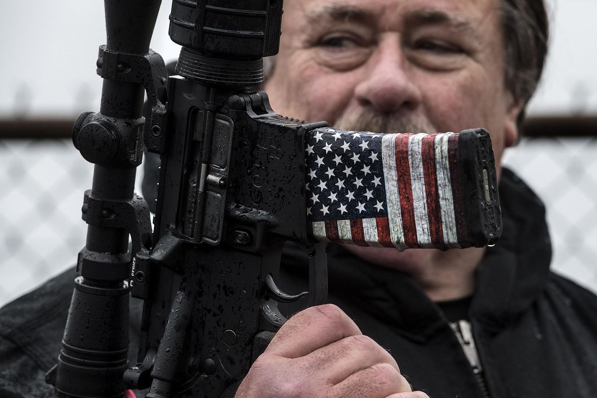 “Any civilian can shoot this fairly easily”, said Clark Albritton about his AR 15 during a counter protest to the student walkout in Coeur d’Alene on March 14, 2018. (Kathy Plonka / The Spokesman-Review)