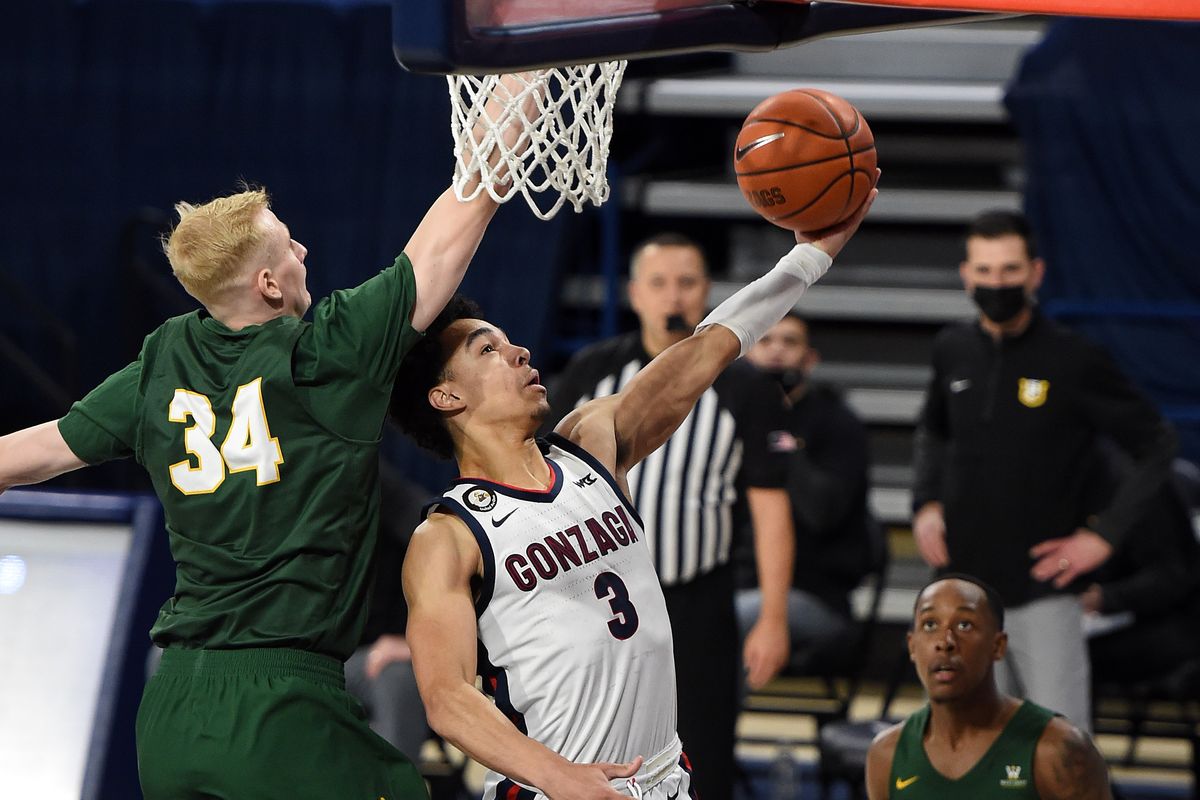 Gonzaga guard Andrew Nembhard (3) heads to the basket as Taavi Jurkatamm (34) defends during the first half of an NCAA college basketball game, Sat., Jan. 2, 2021, in the McCarthey Athletic Center.  (Colin Mulvany/THE SPOKESMAN-REVIEW)