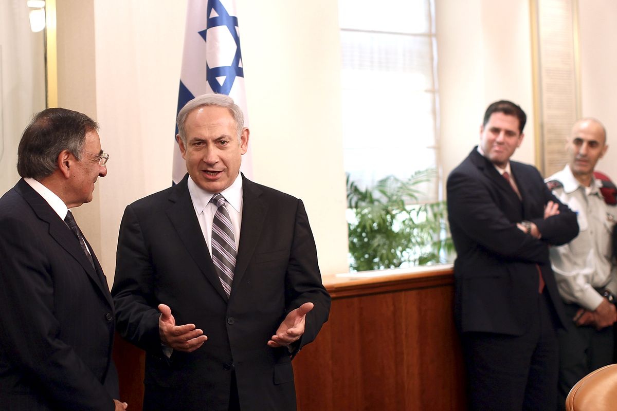 Defense Secretary Leon Panetta, left, talks with Israeli Prime Minister Benjamin Netanyahu in Jerusalem, Israel, Monday, Oct. 3, 2011. (Win Mcnamee / Pool, Getty Images Europe)