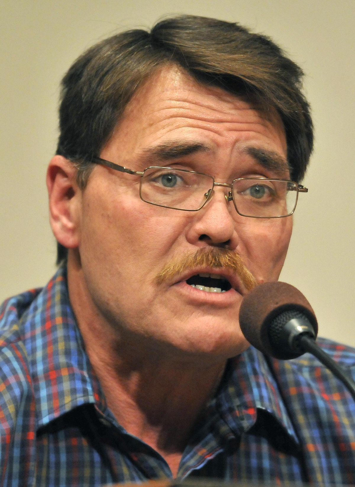 City Councilman Mike Fagan urged residents Tuesdays to read up on theories of jet engines releasing harmful chemicals into the air, widely regarded as a conspiracy theory among academics. Fagan said he wasn’t certain it was happening, but was skeptical of the government’s swift denials. (Jesse Tinsley / The Spokesman-Review)