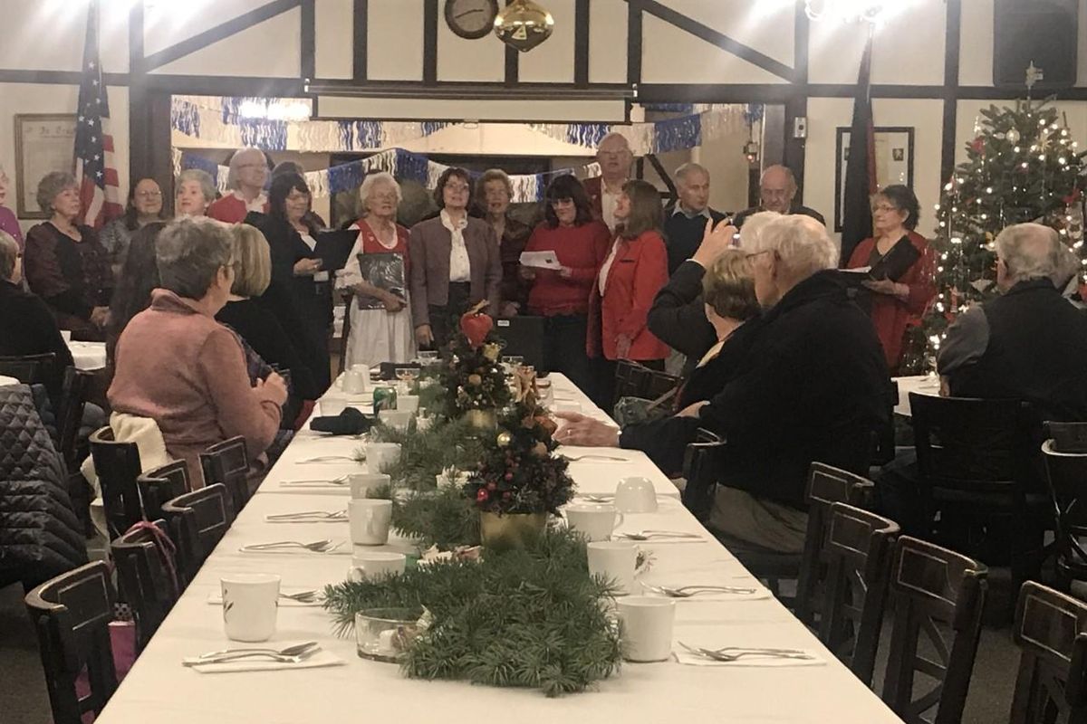 The Concordia Choir performs songs in German and English on Sunday, Dec. 1, 2019, as the German American Society celebrated the listing of its building, Deutsches Haus, on the Spokane Register of Historic Places. (Nina Culver / The Spokesman-Review)