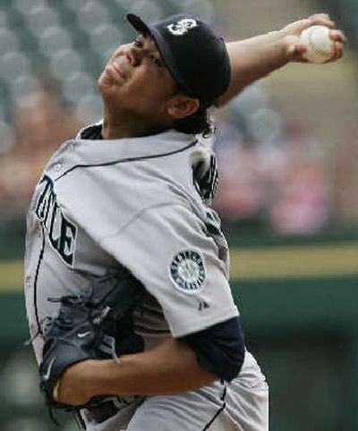 Seattle's Felix Hernandez earned his fourth win of season.
 (Associated Press / The Spokesman-Review)