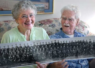 
Dot Babcock points out her husband, John Babcock, in a photograph of the Canadian Expeditionary Force from 1916. Babcock is the only living  Canadian World War I veteran and will celebrate his 107th birthday Monday. He lives in north Spokane.
 (Photos by Dan Pelle / The Spokesman-Review)
