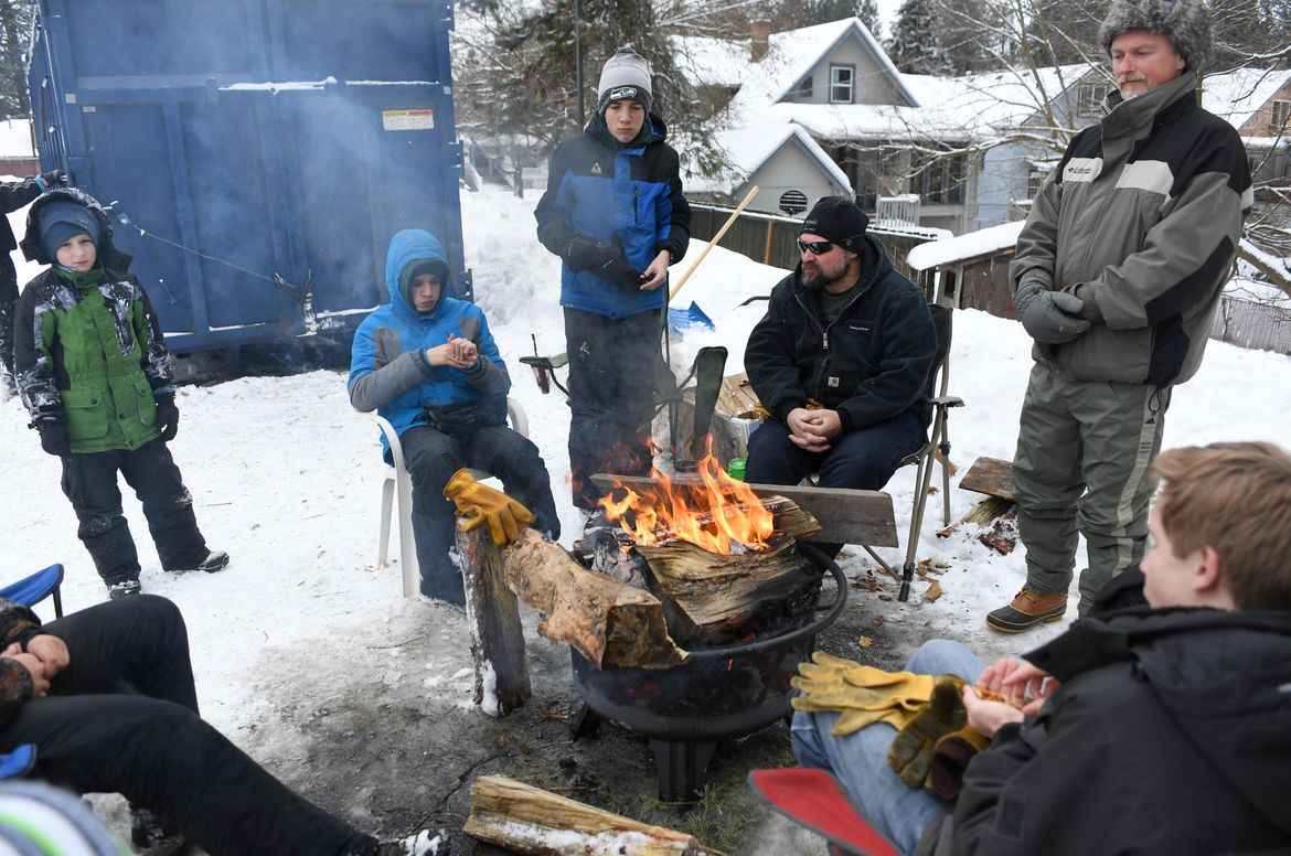 Spokane, Boy Scouts picking up freshcut Christmas trees The