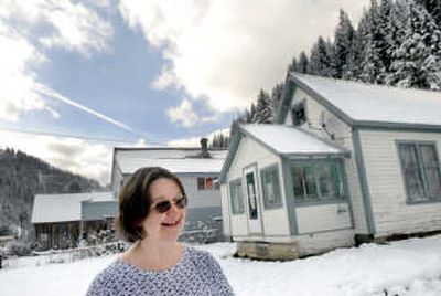
The Spokesman-Review Jackie Stepro  stands outside her Burke, Idaho, home, which now has a new septic system largely paid for by federal and state grants.
 (Kathy Plonka / The Spokesman-Review)