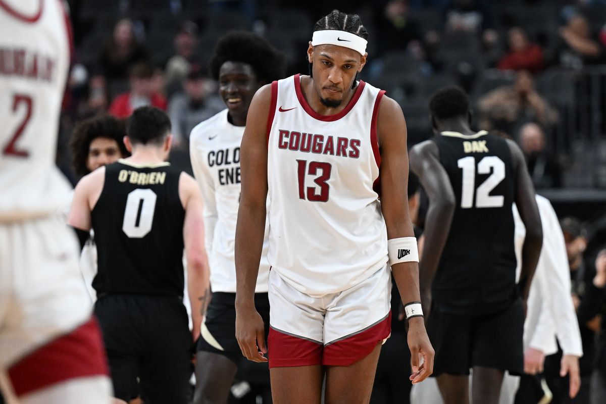 Washington State Cougars forward Isaac Jones (13) reacts after WSU fell to the Colorado Buffaloes during the second half of a Pac 12 basketball tournament game on Friday, Mar 15, 2024, at T-Mobile Arena in Las Vegas, Nev. Colorado won the game 58-52.  (Tyler Tjomsland/The Spokesman-Review)