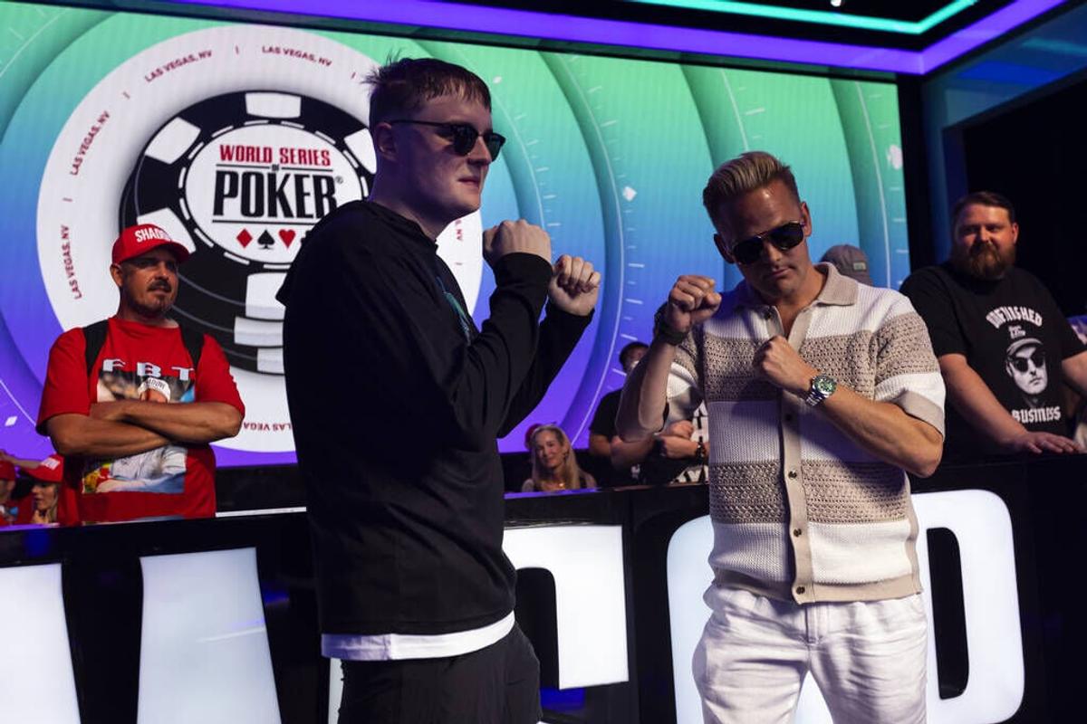 Lauri Saaskilahti, right, and Lucas Jumalon pose for photos after finishing Day 2 as the remaining two players of the final table of the World Series of Poker Main Event at Horseshoe Las Vegas on Tuesday in Las Vegas.  (Chase Stevens)