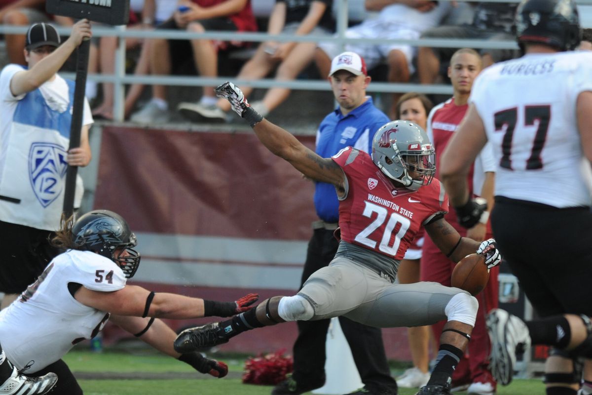Washington State safety Deone Bucannon is forced out of bounds after intercepting the ball against Southern Utah during a 2013 college football game at Martin Stadium in Pullman. After a stint in the NFL, Bucannon finished getting his degree this month. (TYLER TJOMSLAND/The Spokesman-Review)