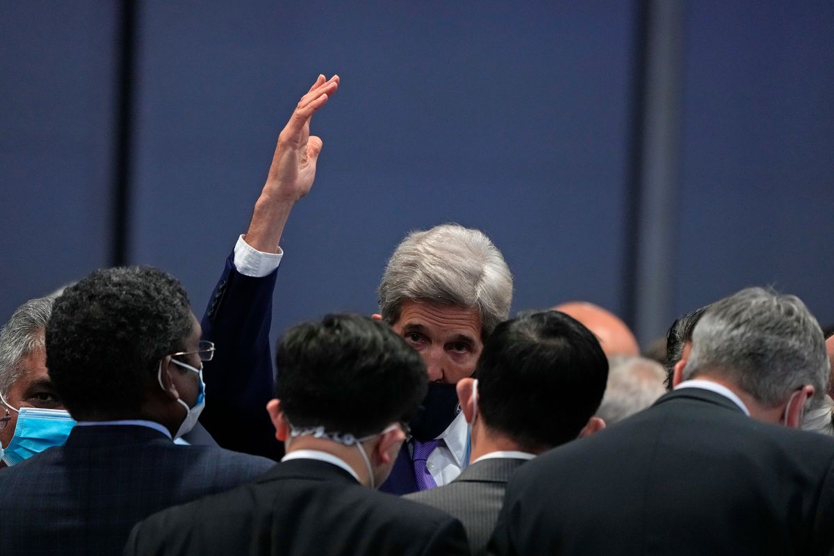 John Kerry, the United States’ climate envoy, gestures at the end of a stocktaking plenary session at the COP26 U.N. Climate Summit on Saturday in Glasgow, Scotland.  (Alastair Grant)