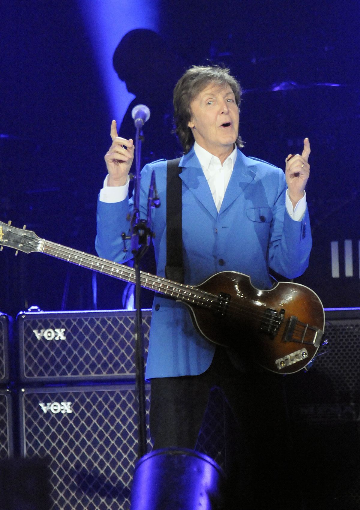 Sir Paul McCartney performs with his band. (Associated Press)