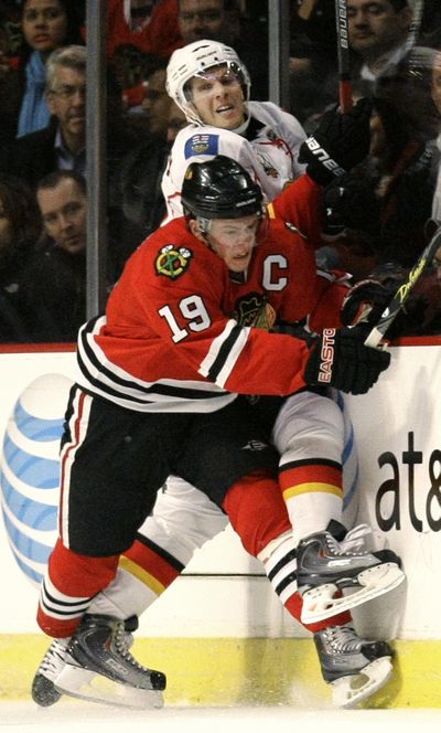 Chicago erased a 5-0 deficit and beat Calgary 6-5 in overtime. (Associated Press / The Spokesman-Review)