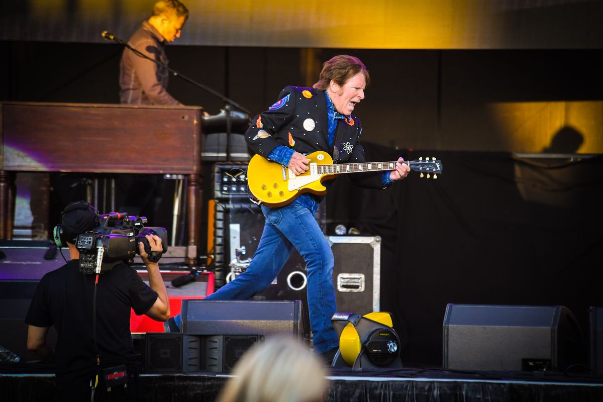 John Fogerty races across the stage while playing “Hey Tonight” in July 2018 at Northern Quest Resort & Casino.  (Dan Pelle/THE SPOKESMAN-REVIEW)