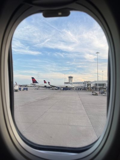 Delta Air Lines aircraft sit at gates at Hartsfield-Jackson Atlanta International Airport. The airline is headquartered in Atlanta and ATL is its biggest hub.  (Eve Chen/USA TODAY)