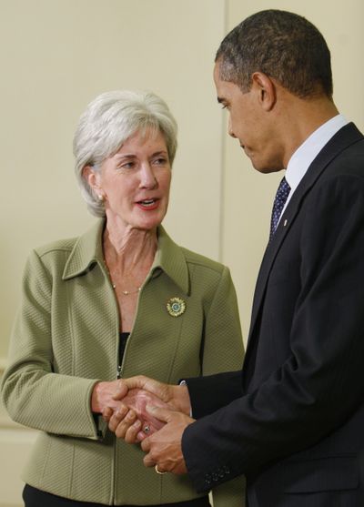 Health and Human Services Secretary Kathleen Sebelius is congratulated by President Barack Obama after her swearing-in ceremony in the Oval Office Tuesday.  (Associated Press / The Spokesman-Review)