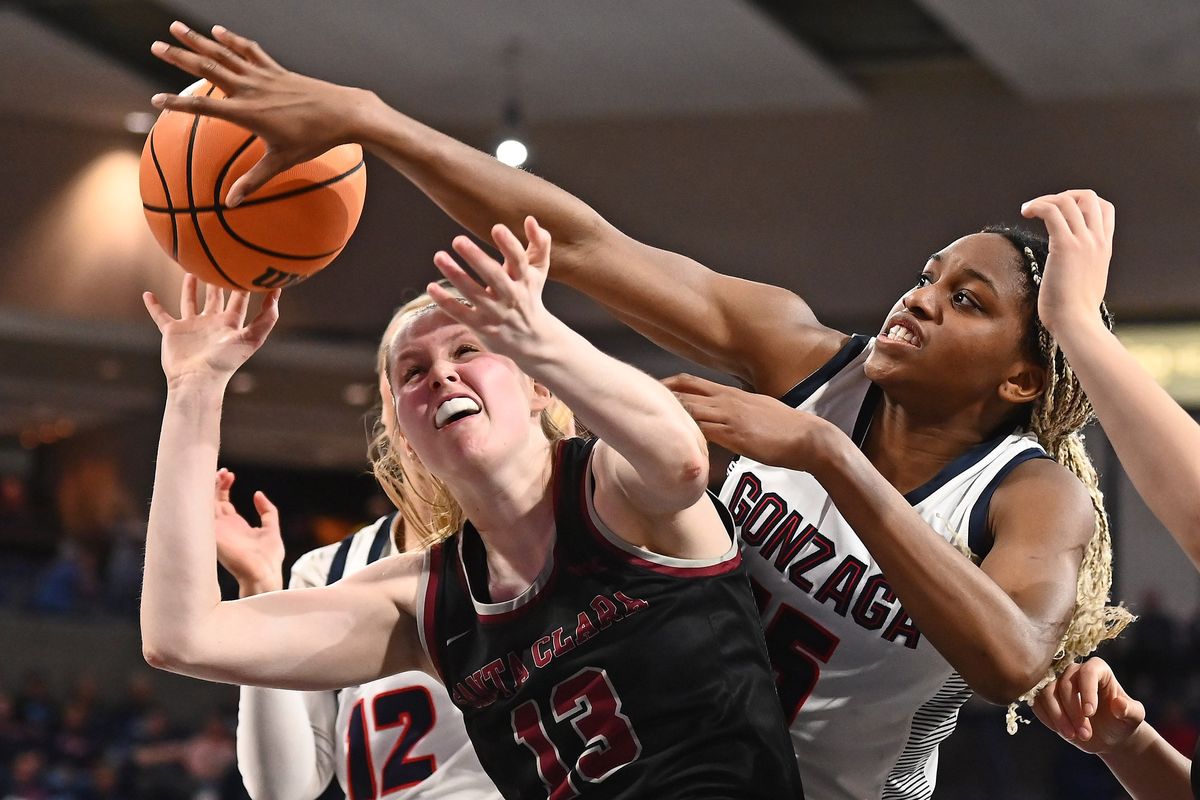 Gonzaga forward Yvonne Ejim fights for a rebound against Santa Clara guard Lara Edmanson during the second half of Saturday’s West Coast Conference game at McCarthey Athletic Center. Gonzaga finished with a 43-30 rebounding advantage.  (James Snook/For The Spokesman-Review)