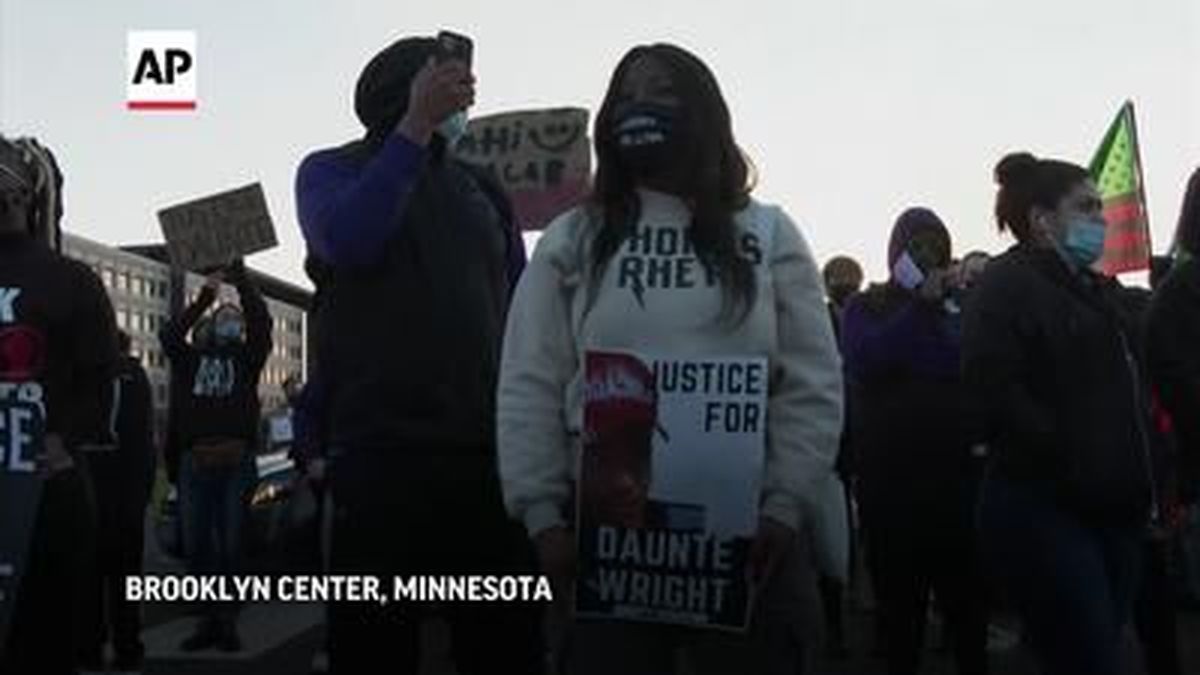 An angry crowd gathered in Brooklyn Center in Minnesota, Friday, to protest the shooting of a 20-year-old Black man at the hands of a police officer.