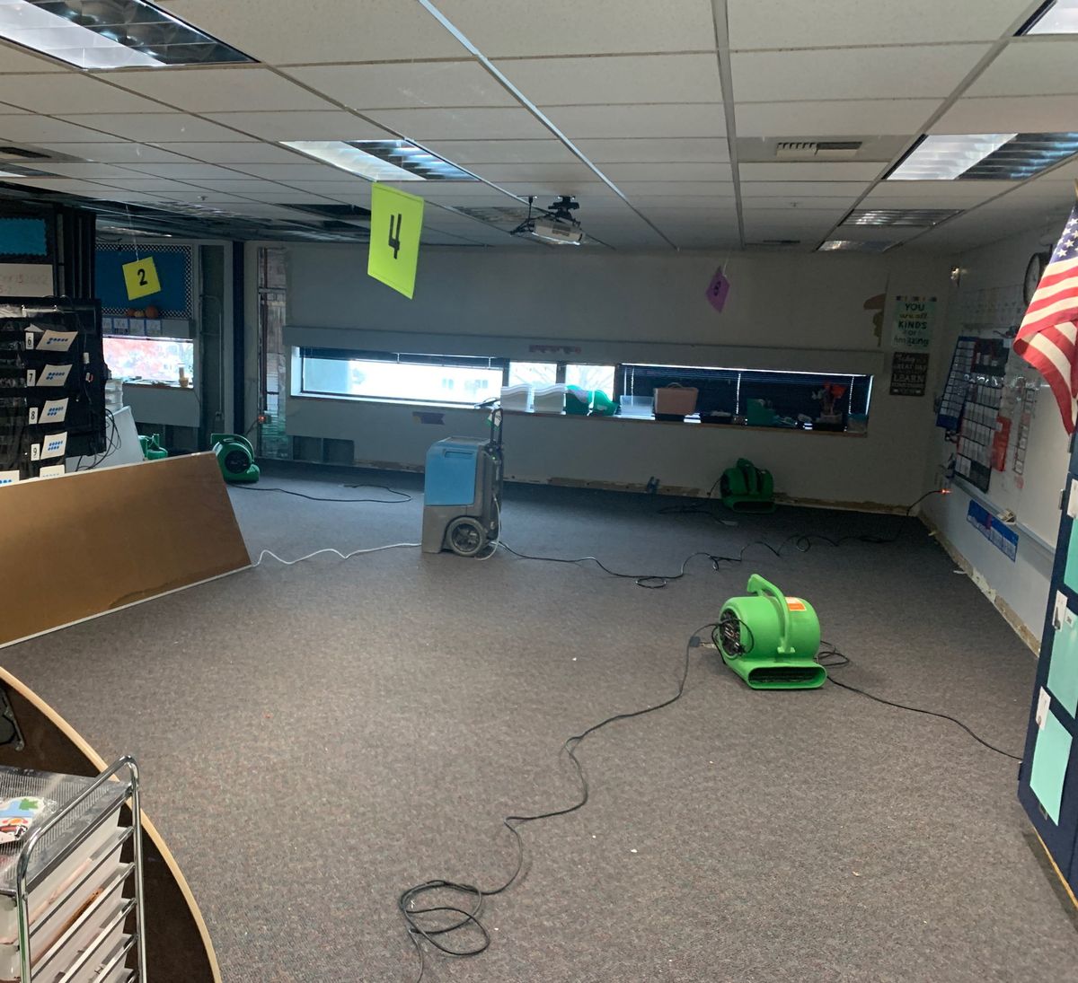 Spokane Public Schools employees have scrambled to mitigate damage to Stevens Elementary School classrooms damaged by flooding caused by burst pipes in the ceiling Monday.  (Courtesy of Adrian Espindola)