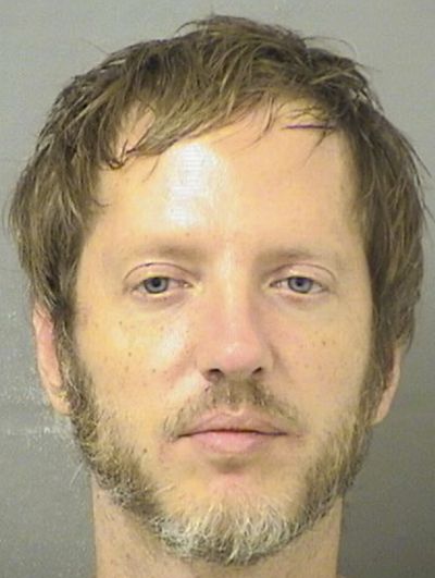This booking image provided by the Palm Beach County Sheriff's Office shows Shaun Michaelsen, 41, who is facing felony charges after police said he let a 12-year-old girl drive his SUV and told her to speed because he wanted to be a “cool father” — even though he is not her dad.  (HOGP)