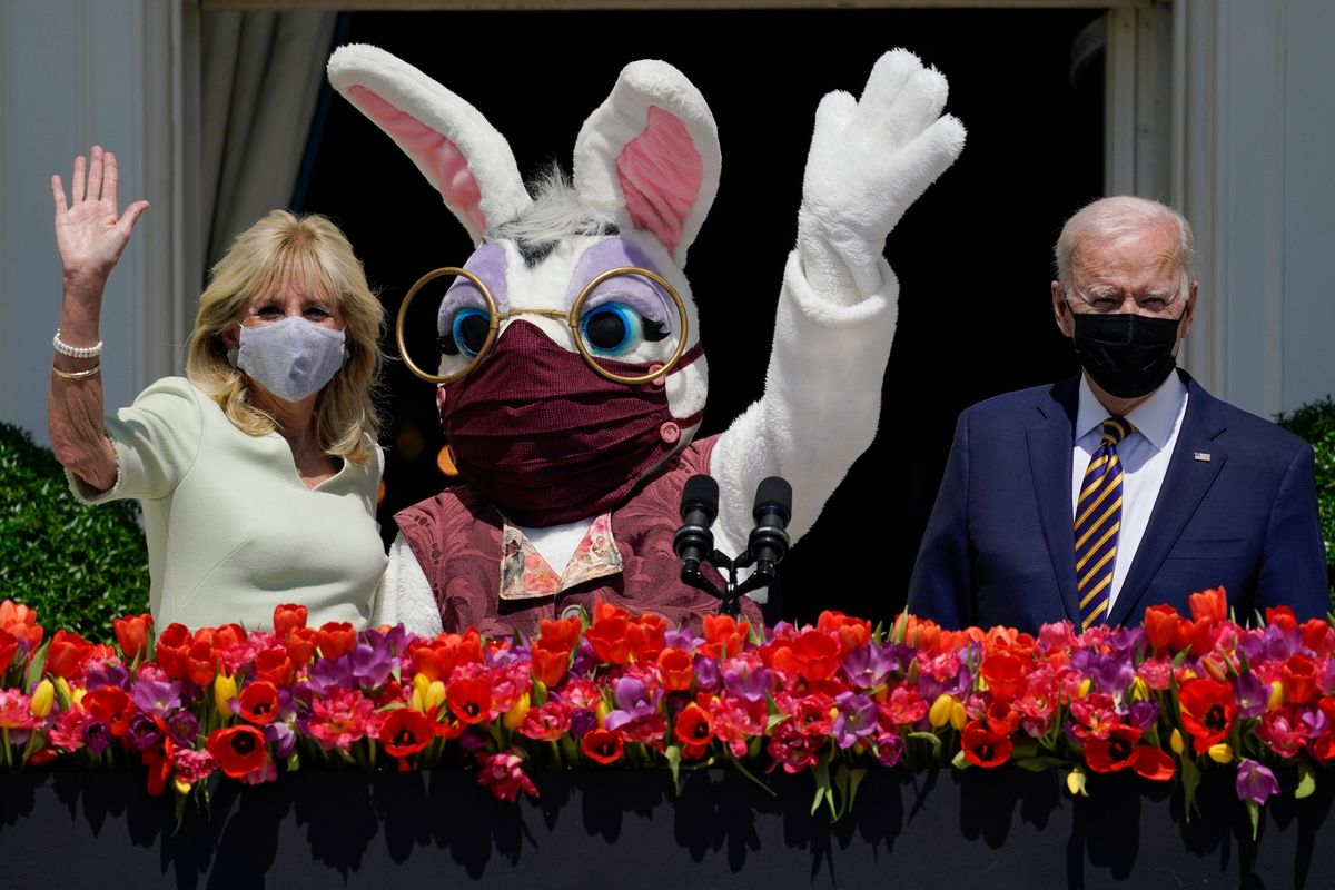 President Joe Biden appears with first lady Jill Biden and the Easter Bunny on the Blue Room balcony at the White House on April 5 in Washington, D.C. (Evan Vucci)