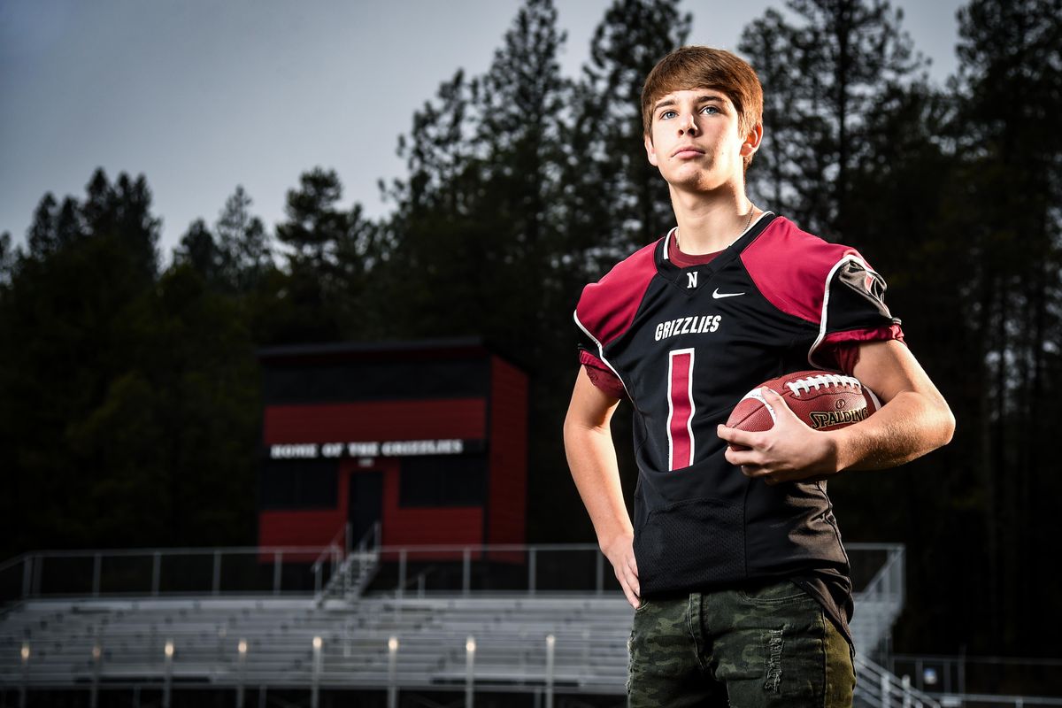Newport High School football player Cody Warner lost brother and teammate Dylan in a May 5th car accident in Newport, Wash. Cody, a junior wide receiver and cornerback, now wears Dylan’s No. 1 on the field. (Colin Mulvany / The Spokesman-Review)