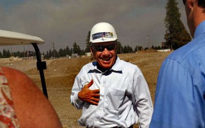 
Developer John Stone leads a tour of the second phase of the Riverstone development in Coeur d'Alene on Tuesday. 
 (Kathy Plonka / The Spokesman-Review)