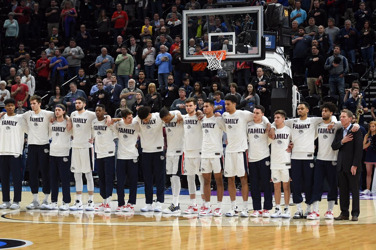 The Zags listen to the Star-Spangled Banner before the start of their second round men's college basketball game in the NCAA tournament with Baylor, Sat., March 23, 2019, in Salt Lake City. (Colin Mulvany / The Spokesman-Review)
