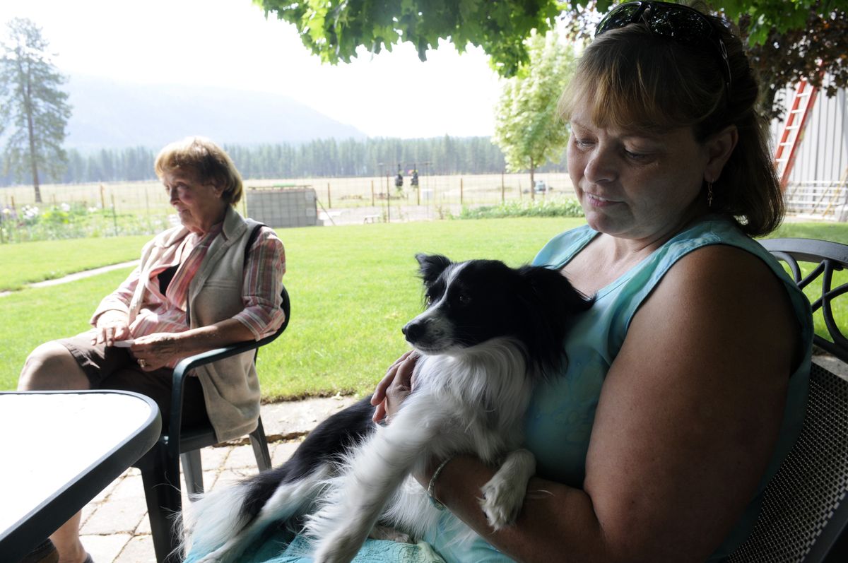 Julie Sowards, 52, sits with her mother, Rosemarie Phillips, left, at the family farm near Northport. (Jesse Tinsley / The Spokesman-Review)