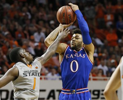 Kansas guard Frank Mason III is one of the leading contenders for national player of the year honors. (Sue Ogrocki / Associated Press)