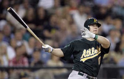 
Oakland rookie Daric Barton got his first major league hit Monday night in the Athletics' 9-3 win over the Mariners in Seattle. Associated Press
 (Associated Press / The Spokesman-Review)