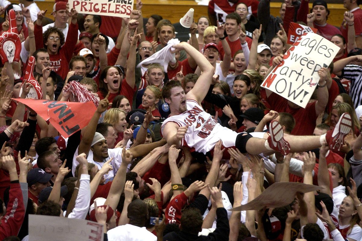 Then: Gregg Smith is lifted by Eastern Washington fans after the Eagles won the Big Sky Conference championship in 2004. (File)