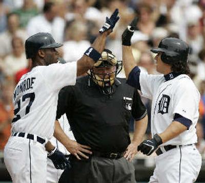 
Detroit's Magglio Ordonez, right, after a two-run home run. 
 (Associated Press / The Spokesman-Review)