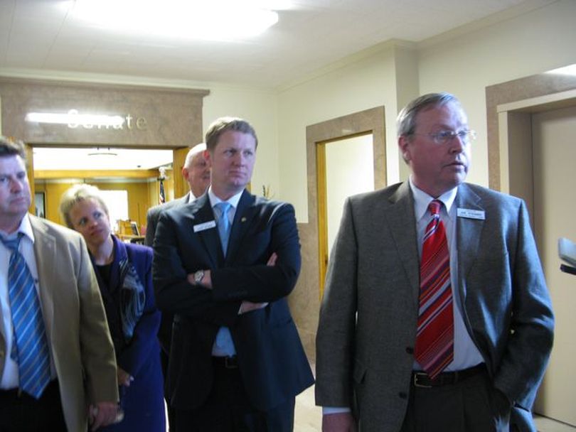 Senate GOP leaders, including Senate Transportation Chairman John McGee, R-Caldwell, center, and Senate Assistant Majority Leader Joe Stegner, R-Lewiston, right, return from a meeting with the governor and House GOP leaders late Monday, at which the governor reiterated his commitment to winning a substantial transportation funding increase before this year's legislative session ends. (Betsy Russell / The Spokesman-Review)