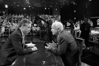 
Sen. John McCain, right, and Jon Stewart talk during a break in taping 