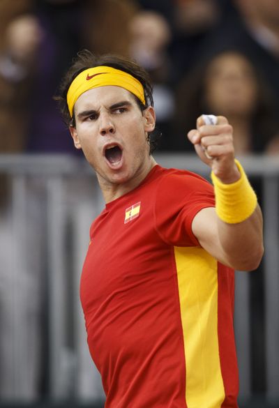 Spain's Rafael Nadal celebrates a point on his way to rallying past Argentina’s Juan Martin Del Potro for the Davis Cup title. (Associated Press)