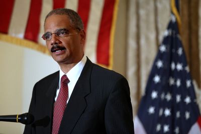 Attorney General Eric Holder said in a statement that it would be “unfair to prosecute men and women … for conduct that was sanctioned in advance by the Justice Department.”  (File Associated Press / The Spokesman-Review)