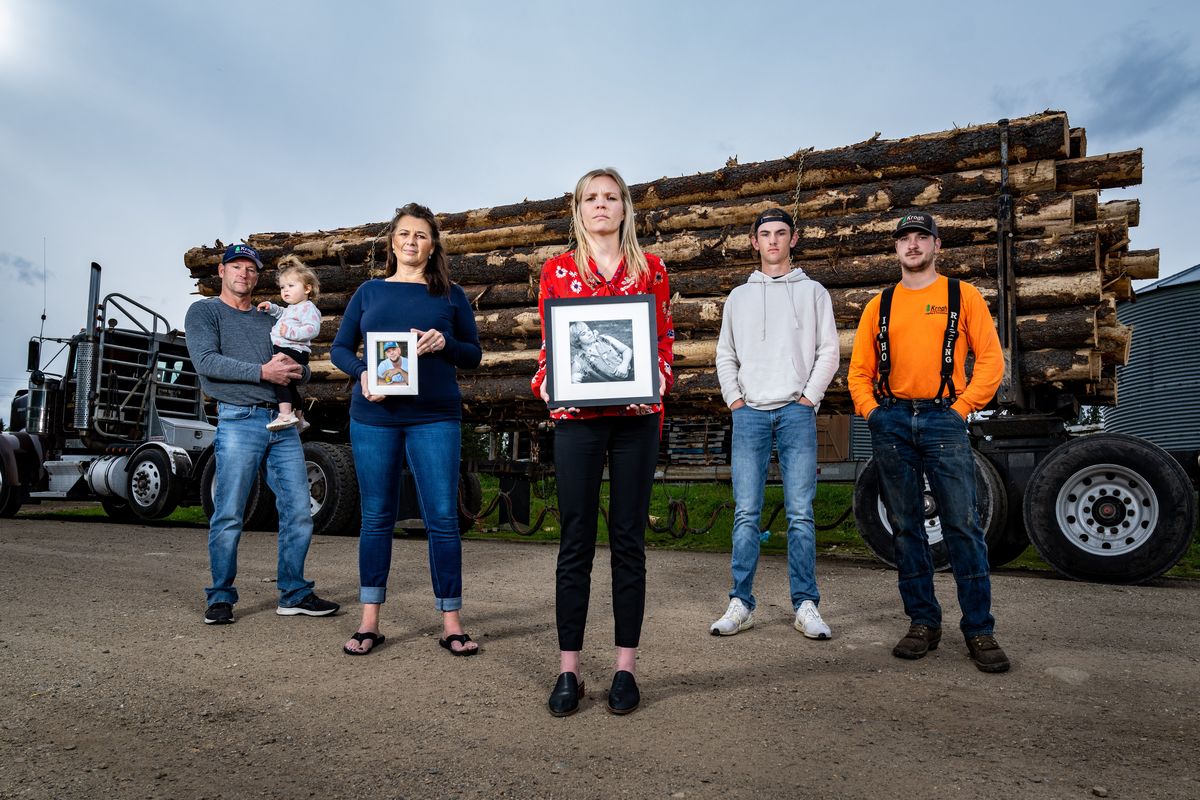 Dylan Krogh, 28, died of a fentanyl overdose in April 2021. His family is still grieving. Left to right: Dylan’s father, Todd Krogh, with his granddaughter Vivienne Pedersen; stepmother Julie Matthews-Krogh; sister Mackenzie Pedersen; and brothers Ben and Austin Krogh. A man who sold Dylan Krogh the drug was sentenced to 14 years in federal prison on Wednesday.   (COLIN MULVANY/THE SPOKESMAN-REVIEW)