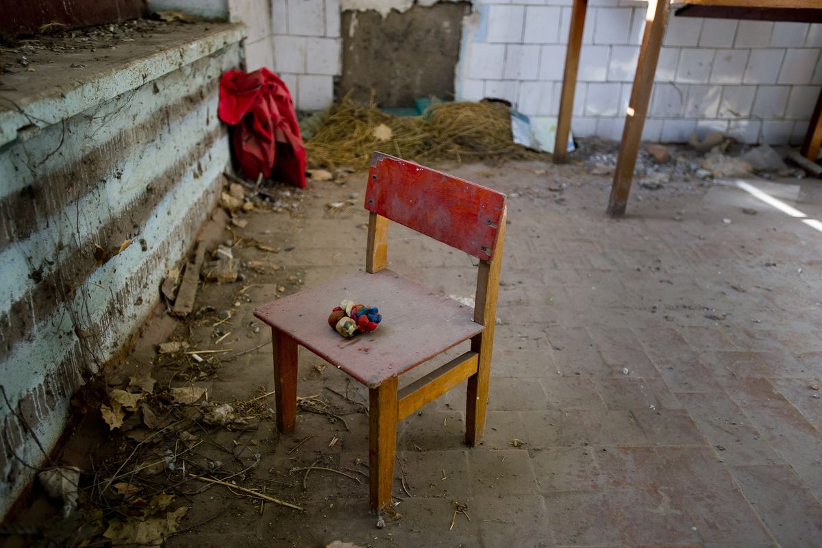 The Solnyshko preschool in Vasilievka, Kyrgyzstan, is a former Soviet-era elementary school and is in need of extensive repairs. In half of the building, windows are missing, and floors and interior framing, unprotected for decades from the elements, have rotted. There is no indoor plumbing or bathrooms. (Colin Mulvany / The Spokesman Review)