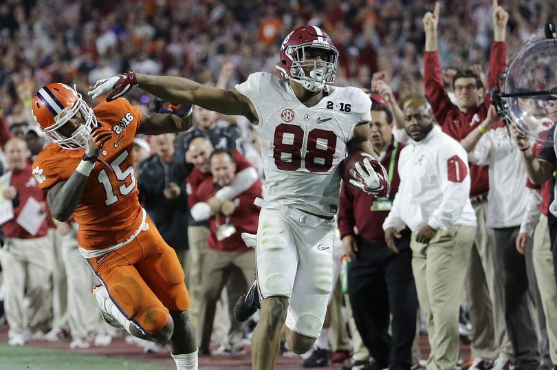 Clemson's T.J. Green (15) knocks Alabama's O.J. Howard out of bounds at the end of a 63-yard pass play that set up a crucial touchdown.