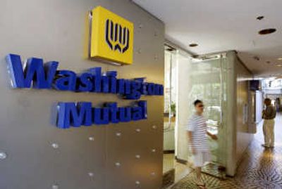 A branch of Washington Mutual bank is shown at the Embarcadero Center in San Francisco in this file photo. Washington Mutual is close to landing a $5 billion cash infusion from private-equity firm TPG and other investors, according to the Wall Street Journal.Associated Press
(Associated Press / The Spokesman-Review)