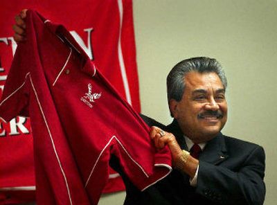 
Rodolfo Arevalo shows his new colors as 25th president of Eastern Washington University Monday. He is the first Latino president of a public four-year school in the state.
 (Brian Plonka / The Spokesman-Review)