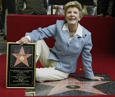 Academy Award winner, and television actress Patty Duke is honored with a star on the Hollywood Walk of Fame on Tuesday, Aug. 17, 2004, in the Hollywood section of Los Angeles. Duke's latest project is 