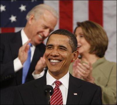 Photo credit: Pablo Matrinez Monsivais / AP
Vice President Joe Biden and House Speaker Nancy Pelosi talk behind President Barack Obama during his speech Tuesday. (The Spokesman-Review)