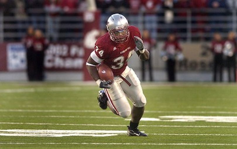 WSU running back #34 Chris Ivory turns the corner and looks for running room against Stanford Saturday November 10, 2007 in Pullman.  CHRISTOPHER ANDERSON The Spokesman-Review (Christopher Anderson / The Spokesman-Review)